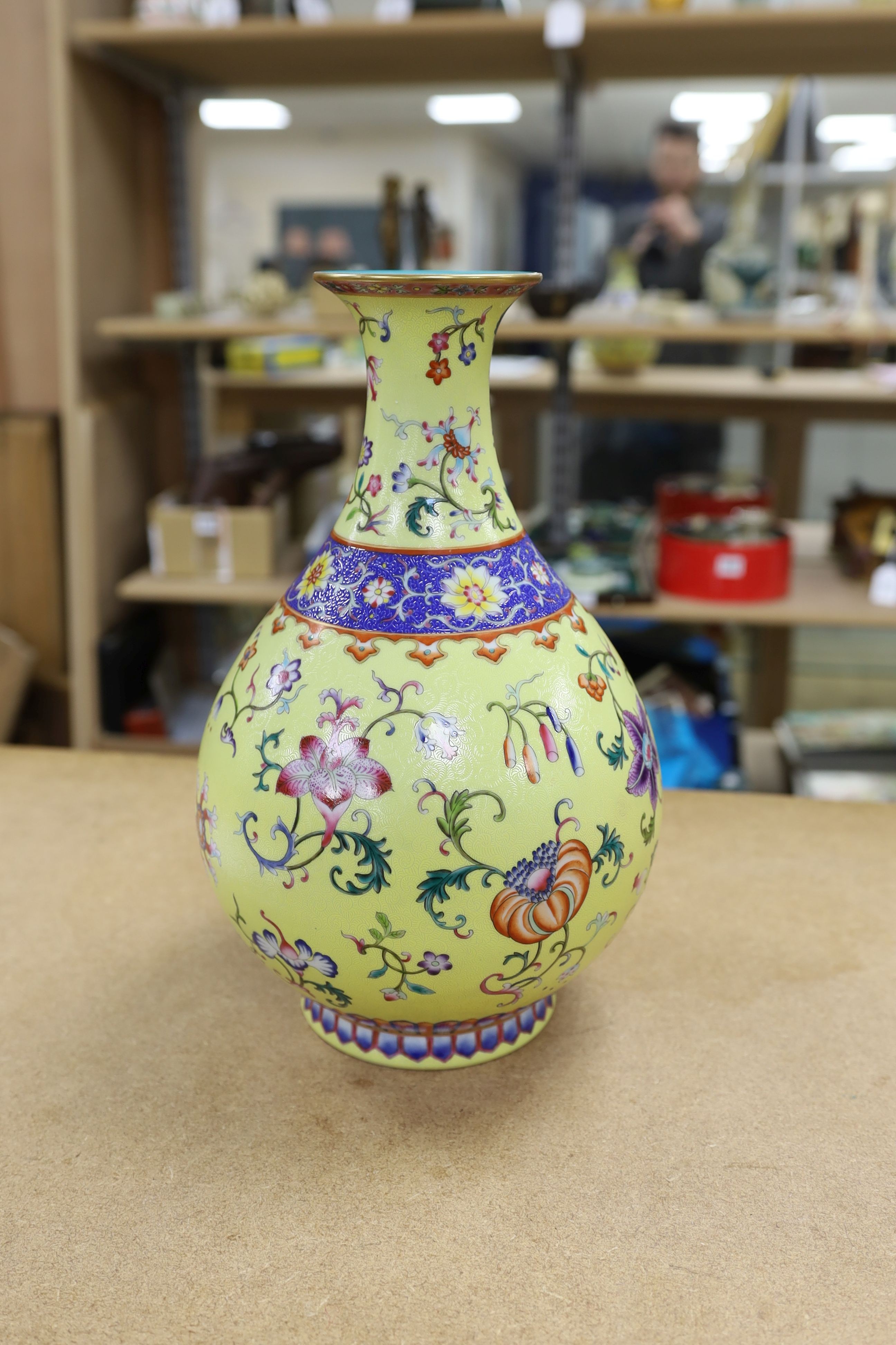 A Chinese yellow-ground porcelain pear-shaped vase, 34cm